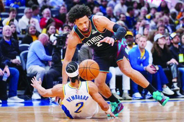 sports_Detroit_resized_compressed Detroit Pistons guard Cade Cunningham (2) drives over Indiana Pacers guard Andrew Nembhard (2) during the first half of an NBA basketball game in Indianapolis. AP