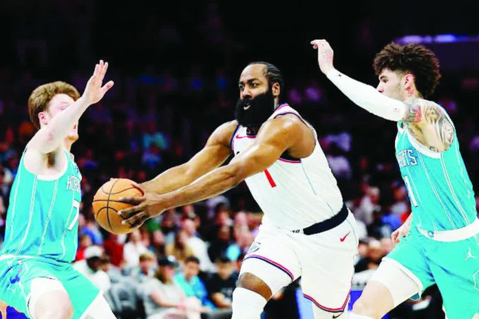 sports_Harden_resized_compressed Los Angeles Clippers guard James Harden (1) drives to the basket past Charlotte Hornets guard LaMelo Ball. NELL REDMOND/AP PHOTO