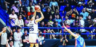 Colegio de San Juan de Letran Knights’ Johnsherick Estrada pulls up for a three-point jumper during their knockout match against Arellano University. NCAA PHOTO