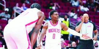 Houston Rockets guard Aaron Holiday delivered 14 of his 18 total points in the fourth quarter in their win over Cleveland Cavaliers. JASON FOCHTMAN/HOUSTON CHRONICLE