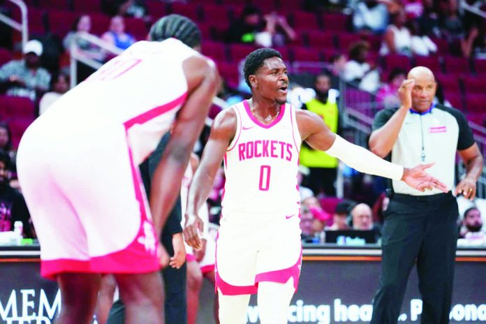 Houston Rockets guard Aaron Holiday delivered 14 of his 18 total points in the fourth quarter in their win over Cleveland Cavaliers. JASON FOCHTMAN/HOUSTON CHRONICLE