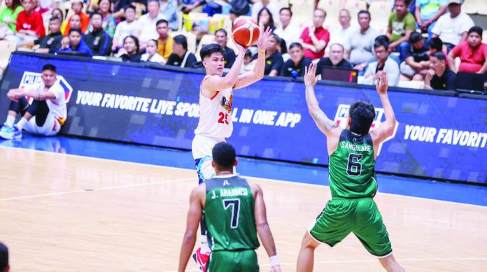 sports_Santillan_copy_resized_compressed Rain or Shine Elasto Painters’ Leonard Santillan hoists a three-pointer against the defense of Terrafirma Dyip’s Mark Sangalang. PBA PHOTO