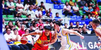 San Miguel Beermen’s Celedonio Trollano drives past Magnolia Chicken Timplados Hotshots rookie Chris Koon during their PBA Philippine Cup clash in Montalban, Rizal. PBA PHOTO