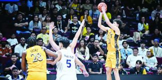 University of Santo Tomas Growling Tigers forward Angelo Crisostomo pulls up for a three-point attempt. UAAP PHOTO
