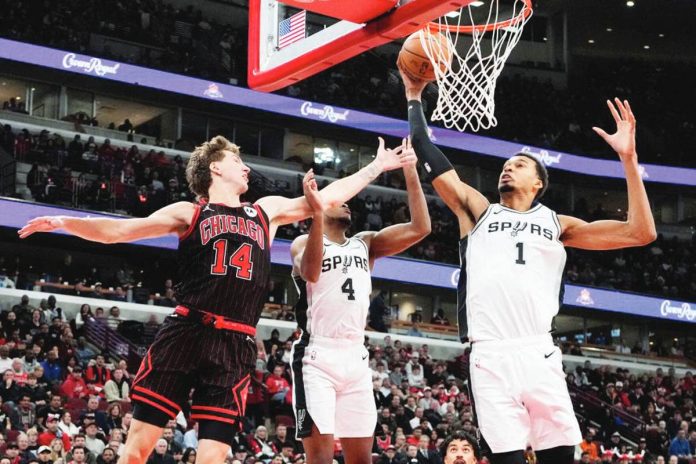sports_Wemby_resized San Antonio Spurs center Victor Wembanyama (1) rebounds a ball against Chicago Bulls forward Matas Buzelis (14). PHOTO COURTESY OF NAM Y. HUH/AP