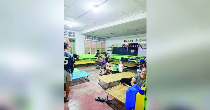 Bacolod stranded passengers copy_superimposed The Bacolod City Government assisted 43 stranded passengers at BREDCO Port and 24 displaced residents from barangays Alijis, 14, and Vista Alegre on December 6 amid Tropical Depression “Wilma.” BCCO PHOTO