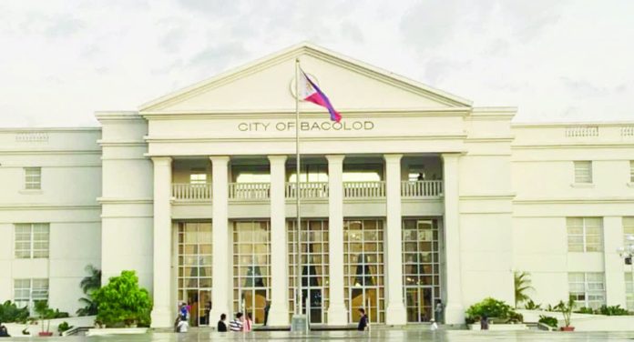 Bacolod_employees_resized_resized_compressed Thirty-three Bacolod City Hall employees, including the Assistant Head of the General Services Office (GSO), face administrative charges over alleged mass falsification of payslips and GSIS loan documents, with cases filed before the Office of the City Mayor. BOMBO RADYO BACOLOD PHOTO