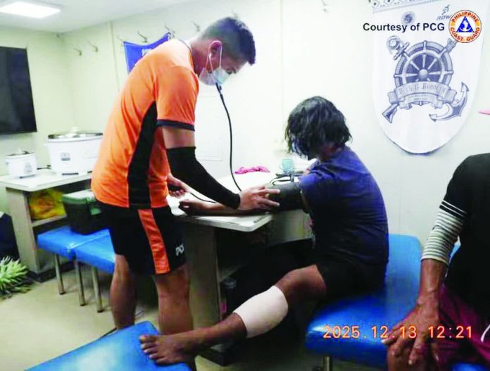Fishermen_hurt1_copy_resized_compressed A Philippine Coast Guard personnel checks the vital signs of rescued fishermen who were water-cannoned by the China Coast Guard in Escoda Shoal in the West Philippine Sea on December 12, 2025. PHOTO FROM THE PHILIPPINE COAST GUARD
