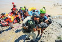 Death toll in Indonesia floods passes 500 A sick villager was evacuated from a flooded area of Aceh in Indonesia. AFP VIA GETTY IMAGES
