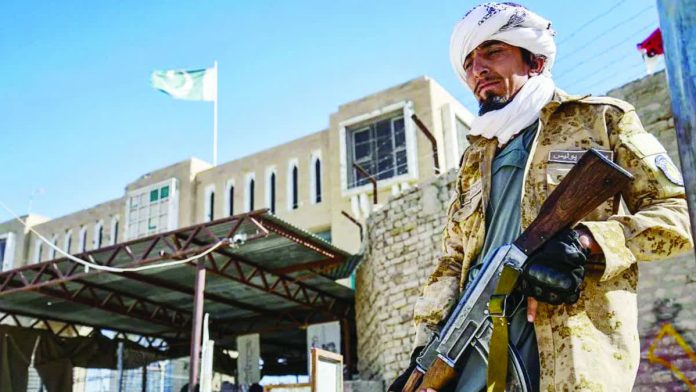 Pakistan_resized_compressed A Taliban security personnel is posted at the Pakistan border in Spin. Fighting broke out close to the Afghan border city of Spin Boldak, which has seen deadly clashes in recent months. GETTY IMAGES