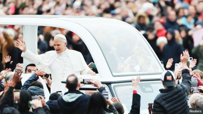 Pope Leo urges Pope Leo greets well-wishers at the Vatican City. REUTERS
