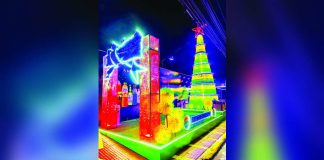 A solar-powered Christmas tree crafted from recyclable Mt. Dew bottles was unveiled on December 3 in Barangay Bata, Bacolod City. JEMOTO VLOG FB PHOTO