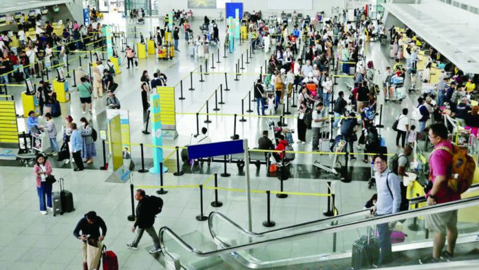 aviation_resized_compressed The Civil Aeronautics Board data tallied 46.84 million passenger traffic from January to September 2025. Photo shows travelers at the Ninoy Aquino International Airport. INQUIRER FILE PHOTO