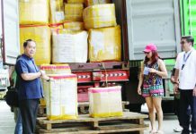 BOC starts delivery of abandoned ‘balikbayan’ boxes to kin of OFWs Bureau of Customs (BOC) Commissioner Ariel Nepomuceno (left) leads the inspection and distribution of the abandoned balikbayan boxes at a BOC facility in Port Area, Manila Thursday, Dec. 18, 2025. President Ferdinand R. Marcos Jr. earlier ordered the release of around 130,000 balikbayan boxes that were left unattended at the BOC. PNA PHOTO BY YANCY LIM