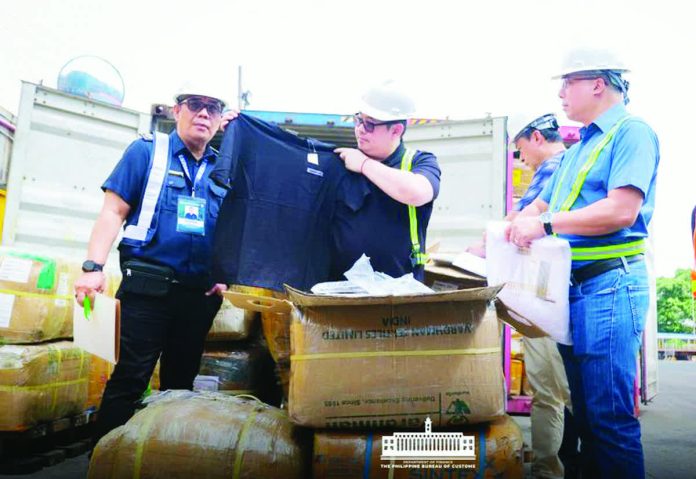 counterfeit_haul.JPG_resized_compressed The Bureau of Customs, through its Intellectual Property Rights Division, seized counterfeit wearing apparel valued at around P482 million in October 2025. The items bore the trademarks of multiple global and local brands. BOC PHOTO