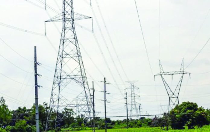 dec_transmission_rates_resized_compressed Power transmission lines in a part of Bulacan province in this undated photo. On Tuesday, Dec. 17, 2025, officials of the National Grid Corp. of the Philippines announced a decline in the effective transmission rate for December to P1.35 per kilowatt hour (kWh), from P1.51/kWh in November, due to consumption changes. PNA PHOTO BY JOAN BONDOC
