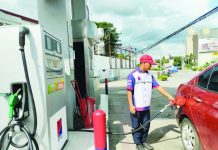 Fuel prices drop before Christmas A gas station attendant in Pavia, Iloilo pumps fuel into a customer’s car. Starting 6 a.m. today, Dec. 23, 2025, pump prices would be cut by P0.80 per liter for gasoline, P1.30 for diesel and P1.60 for kerosene. PN PHOTO