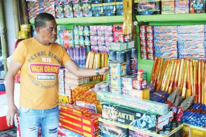 ime firecracker vendors copy Dante Talaboc, president of the Barangay Buhang Firecrackers and Pyrotechnics Association, says firecracker and fireworks sales this year have been slower compared to previous years, which he attributed partly to economic hardship. AJ PALCULLO/PN