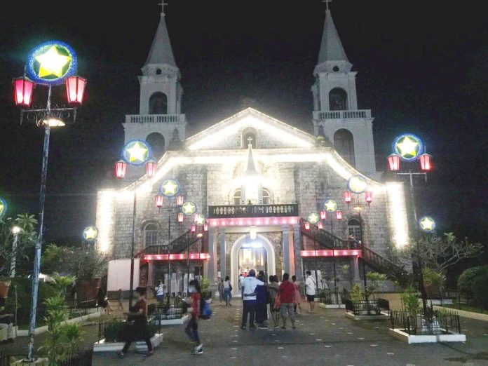 The Jaro Metropolitan Cathedral is illuminated with Christmas lights as churchgoers arrive for Simbang Gabi during the Advent season a few Christmases back, reflecting the long-standing Ilonggo tradition of Masses in preparation for the celebration of Christmas. PN FILE PHOTO