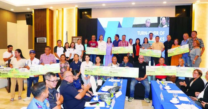 ime_ipg_funds_pic_1_copy_resized_compressed Gov. Arthur Defensor Jr. personally turned over the P212.94 million worth of checks to the beneficiaries during the Provincial Peace and Order Council (PPOC) Special Meeting on Dec. 23, 2025. BALITA HALIN SA KAPITOLYO PHOTO