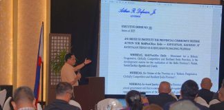 Gov. Arthur Defensor Jr. presents Executive Order No. 111, Series of 2025, instituting the Provincial Community Defense Action for MoRProGRes Iloilo, during the Provincial Peace and Order Council special meeting on December 23, 2025 as the province adopts an integrated framework on peace, security, and resilience. PHOTO FROM BALITA HALIN SA KAPITOLYO