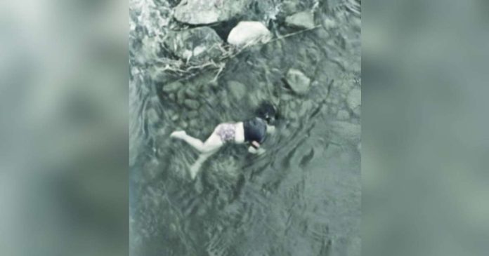 janiuay river body_superimposed The lifeless body of a 46-year-old woman was found floating in the river at Barangay Jibolo, Janiuay, Iloilo early Friday morning, December 12, 2025. BOMBO RADYO ILOILO 837KHZ PHOTO