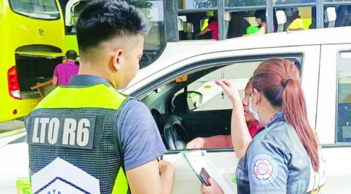 neljoy inspection copy_compressed Land Transportation Office enforcers inspect public utility vehicles and conduct roadside checks at key terminals and highways in Iloilo City and province as part of Oplan Biyaheng Ayos! “PASKO 2025,” aimed at ensuring roadworthiness and passenger safety amid the holiday travel surge. LTO PHOTO