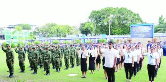 Police Brigadier General Josefino Ligan, director of the Police Regional Office (PRO-6), administers the oath of office of the 24 newly appointed patrolmen and 24 non-uniformed personnel on Dec. 26, 2025, at the PRO-6 Grandstand, Camp Gen. Martin Teofilo B. Delgado in Fort San Pedro, Iloilo City. PRO-6 PHOTO