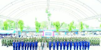 Newly appointed patrolmen and patrolwomen of the Police Regional Office–Negros Island Region take their oath during the induction ceremony held on Dec. 19, 2025 at the Negros Occidental Police Provincial Office Grandstand in Bacolod City. PBGEN TOM IBAY FB PHOTO