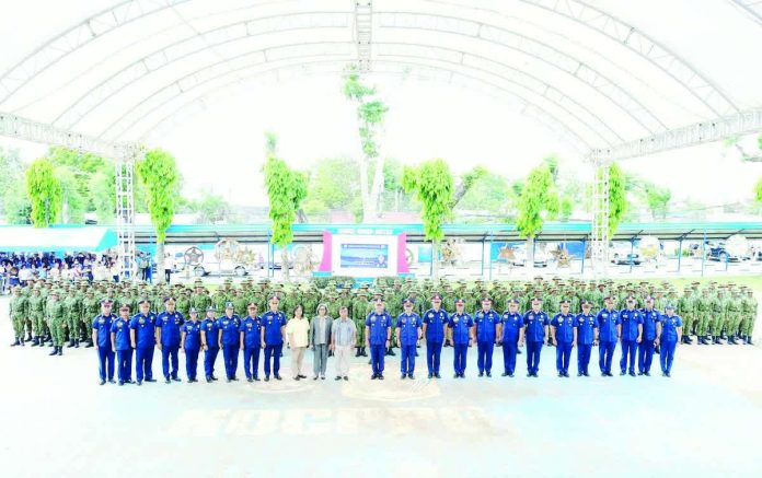 Newly appointed patrolmen and patrolwomen of the Police Regional Office–Negros Island Region take their oath during the induction ceremony held on Dec. 19, 2025 at the Negros Occidental Police Provincial Office Grandstand in Bacolod City. PBGEN TOM IBAY FB PHOTO
