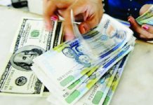 Yearender: Peso faces pressure heading into 2026 The Philippine peso closed 2025 at 58.79 to the dollar on Dec. 29, 2025, down 1.6 percent from its end-2024 level. AFP FILE PHOTO