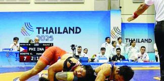 Filipino wrestlers in action during the 33rd Southeast Asian Games. CONTRIBUTED PHOTO