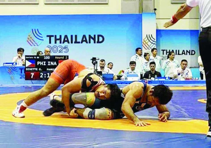 ph wrestling_compressed Filipino wrestlers in action during the 33rd Southeast Asian Games. CONTRIBUTED PHOTO