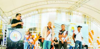 (From left) Mayor Greg Gasataya presented to the public newly regularized job order workers Cesar Zuniega Jr., Ritchie Opao, and Vicente Candar, during the December 1 flag-raising ceremony at the Bacolod City Government Center. BCCO PHOTO