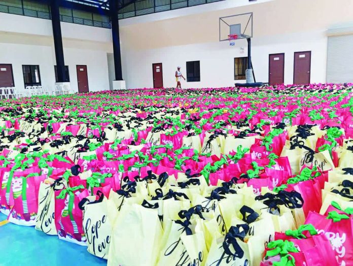 relief_packs_resized_compressed Thousands of Noche Buena relief packs lined up at the San Remigio covered time ahead of distribution to 9,521 families across the town’s barangays as part of the local government’s Christmas assistance program. 104.5 BRIGADA SAN JOSE-ANTIQUE