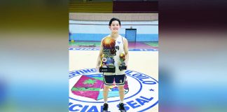 Paul Adrian Barcelona proudly holds the championship trophy and his Finals MVP award after leading Bacolod Tay Tung High School to the title in the Iloilo 1st Governor’s National Cup at the Iloilo Sports Complex. CONTRIBUTED PHOTO