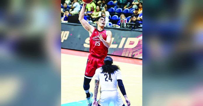 sports Ginebra_superimposed_compressed Barangay Ginebra San Miguel Kings’ Japeth Aguilar converts on a close-range basket. PBA PHOTO