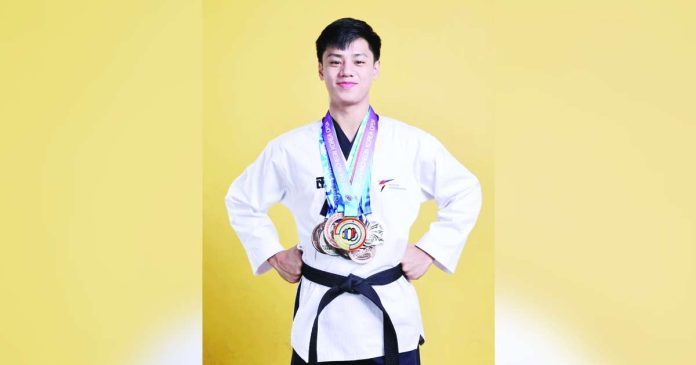 sports PH_superimposed Justin Kobe Macario delivered the Philippines’ first gold medal of the 33rd SEA Games after topping the men’s freestyle poomsae event. FACEBOOK PHOTO