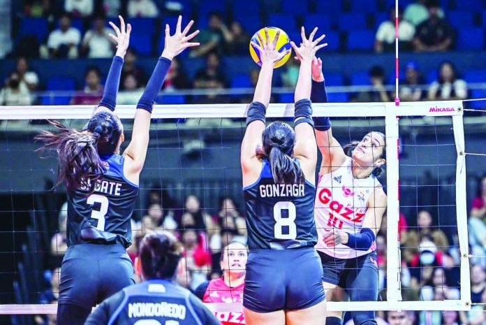 sports_Angels Petro Gazz Angels star Brooke Van Sickle scores against Guimarasnon Jovelyn Gonzaga of the ZUS Coffee Thunderbelles. PVL PHOTO