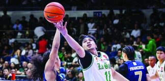 De La Salle University Green Archers’ Jacob Cortez attacks the defense of National University Bulldogs guard Steve Nash Enriquez for a layup. UAAP PHOTO