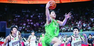 De La Salle University Green Archers forward Vhoris Marasigan drives strong to the rim for a layup during Game 1 of the UAAP Season 88 finals. UAAP PHOTO