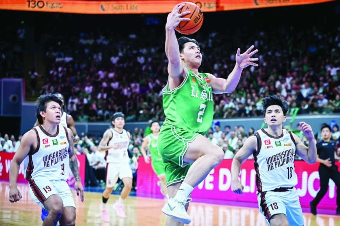 sports_DLSU_resized_compressed_resized_compressed De La Salle University Green Archers forward Vhoris Marasigan drives strong to the rim for a layup during Game 1 of the UAAP Season 88 finals. UAAP PHOTO