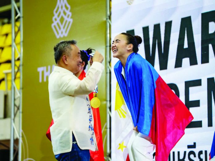 sports_Fin_copy_resized_compressed Aleah Finnegan celebrates after being awarded the women’s vault gold, which was initially given to a Thai athlete. POC PHOTO