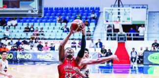 Barangay Ginebra San Miguel Kings’ Raymond Aguilar beats Blackwater Bossing’s Bradwyn Guinto and Dalph Panopio for the rebound. PBA PHOTO