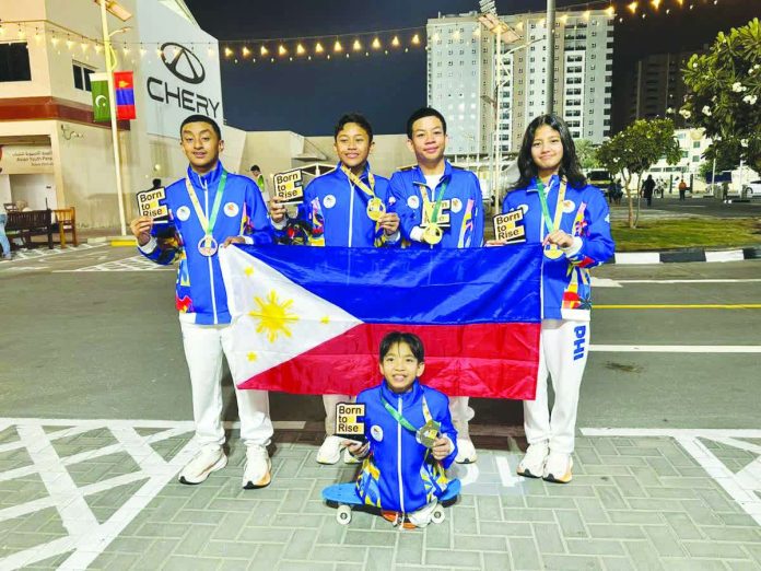 sports_Ilonggo_resized_compressed Philippine medalists in para swimming (from left): Bladimir Sebastian Gonzales, Ric Daniel Pasadilla, Raemond Adefuin, Mary Hannah Diesto, and (front) Zach Lucas Obsioma. PSC PHOTO