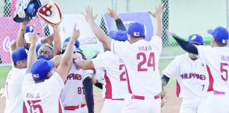 The Philippine Blu Boys celebrate after defeating Singapore in the men’s softball finals of the 33rd Southeast Asian Games. PSC PHOTO