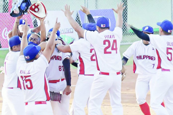 sports_PH_resized_compressed The Philippine Blu Boys celebrate after defeating Singapore in the men’s softball finals of the 33rd Southeast Asian Games. PSC PHOTO