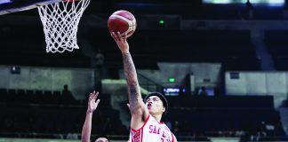 Ilonggo John Bryan Sajonia of the San Beda Red Lions drives to the basket during their Final Four clash against the CSB Blazers. NCAA PHOTO