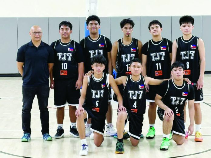 sports_T_resized_compressed Members of TJ7 Basketball Development Center team with head coach Mark Belangel. CONTRIBUTED PHOTO
