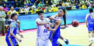 TNT Tropang 5G's Henry Galinato Jr. loses the ball against the defense of Magnolia Chicken Timplados Hotshots' Zavier Lucero. PBA PHOTO